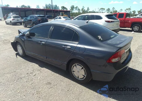 2009 Honda Civic Hybrid from USA, damaged, VIN JHMFA362X9S013436